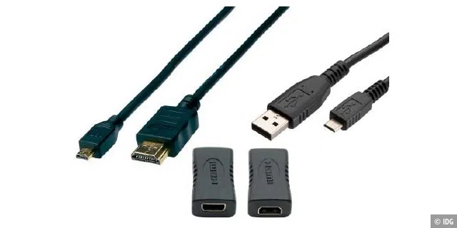 Eher ungewöhnliche Anschlüsse: Das Motorola Atrix Lapdock mit USB- und HDMI-Stecker. Deshalb sind mehrere Adapter für den Anschluss des Raspberry Pi erforderlich, die sie teilweise kombinieren müssen.